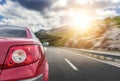 Red car rushing along a high-speed highway. Royalty Free Stock Photo