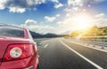 Red car rushing along a high-speed highway. Royalty Free Stock Photo