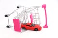 Red car in shopping cart. Royalty Free Stock Photo