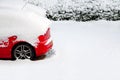 Red car in the snow Royalty Free Stock Photo