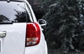 Red car taillights look modern with black and white background images.