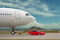 Red car is towing airplane. Leader. Concept. Royalty Free Stock Photo