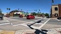 Red car Traffic at a 4 way intersection clear blue sky on Florida Ave Royalty Free Stock Photo