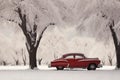 Red car winter. Generate ai Royalty Free Stock Photo