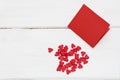 Red card and a few little hearts around. Royalty Free Stock Photo