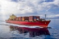 A red cargo ship loaded with many containers Royalty Free Stock Photo