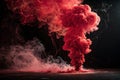 red carmin smoke explosion on a black background - generated by ai Royalty Free Stock Photo