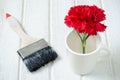 Red Carnation flower with paint brush Royalty Free Stock Photo