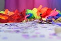 red carnival costume mask with colorful confetti and streamers joyful brazilian party celebration on white background with space Royalty Free Stock Photo