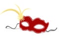 Red carnival mask with gold feathers on white background