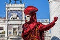 Red Carnival Mask in St Mark's square, Venice, Italy Royalty Free Stock Photo