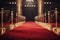 Red Carpet With Gold Barriers and Chandelier, A Glamorous Venue Entranceway, Red carpet rolling out in front of glamorous movie Royalty Free Stock Photo