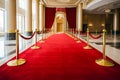 Red carpet with golden barriers and red ropes. Marking the route for celebrities, heads of state on ceremonial events, formal