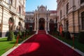 red carpet leading to the entrance of a grand building, such as a palace or cathedral Royalty Free Stock Photo