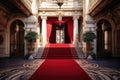 a red carpet leading to a grand building entrance