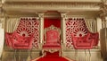 Red carpet leading to king throne on arabesque style with golden colmuns pillar Royalty Free Stock Photo