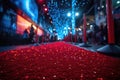 The red carpet at a premiere event, sparkling under glamorous lights with a crowd of spectators on the side, evokes