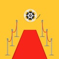 Red carpet and rope barrier golden stanchions turnstile Movie premiere Cinema reel. Isolated template Yellow background. Flat desi Royalty Free Stock Photo