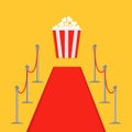 Red carpet and rope barrier golden stanchions turnstile Popcorn box. template Yellow background. Flat design Royalty Free Stock Photo