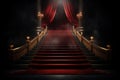 Red carpet on the stairs on a dark background. The path to glory, victory and success Royalty Free Stock Photo