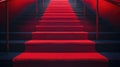 Red carpet on the stairs on a dark background. The path to glory, victory and success Royalty Free Stock Photo