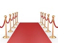 Red carpet between two gold stanchions with rope Royalty Free Stock Photo