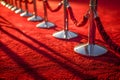 Concept Red Carpet, Velvet Rope, Red carpet and velvet rope for VIP events and glamorous occasions Royalty Free Stock Photo