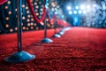 Red carpet and velvet rope for VIP events and glamorous occasions. Concept Red Carpet Events, VIP Royalty Free Stock Photo