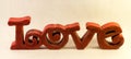 Red Carved Wooden Love Sign