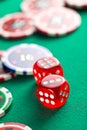 The red casino dice and casino chips Royalty Free Stock Photo