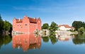 Red castle in the middle of pond Royalty Free Stock Photo