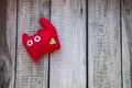 Red cat toy made of felt with a green heart Royalty Free Stock Photo