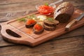 The red caviar with black bread, dill and lemon on  wooden board Royalty Free Stock Photo
