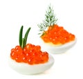 Red caviar canape with quail egg and rosemary twig Royalty Free Stock Photo