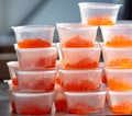 Red caviar in containers in the market