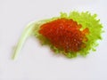 Red caviar fish on a white background