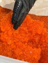 red caviar in plastic container. Salmon caviar, diet food Royalty Free Stock Photo