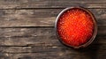 Red caviar on a plate.