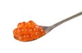 Red caviar in spoon isolated on white background with clipping path. Close up. Macro. Royalty Free Stock Photo