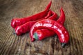 Red cayenne chili pepper on an old board Royalty Free Stock Photo