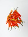 Fresh Red and yellow Cayenne Pepper or Cabe Rawit Merah in Indonesian White Background