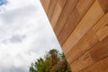 Red cedar lumber close up nautural wood grain texture and sky copy space background