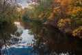 Red Cedar river winding through Michigan State University campus during the Fall