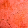 Red cement crack wall texture Royalty Free Stock Photo