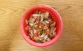 Red ceramic bowl with pico de gallo - typical Mexican cuisine side dish Royalty Free Stock Photo