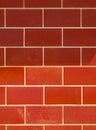Red ceramic brick tile wall. colorful wall tiles design for bathroom, washroom and kitchen. Background from slate natural stone ti Royalty Free Stock Photo
