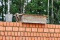 Red ceramic bricks at the construction site. Keramoblock. Hollow brick. Construction of a red brick building. Close-up. Material Royalty Free Stock Photo