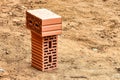 Red ceramic bricks at the construction site. Keramoblock. Hollow brick. Construction of a red brick building. Close-up. Material Royalty Free Stock Photo