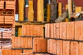 Red ceramic bricks at the construction site. Keramoblock. Hollow brick. Construction of a red brick building. Close-up. Material Royalty Free Stock Photo