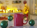 Red Ceramic Mug Mock Up with some Christmas Ornaments Royalty Free Stock Photo